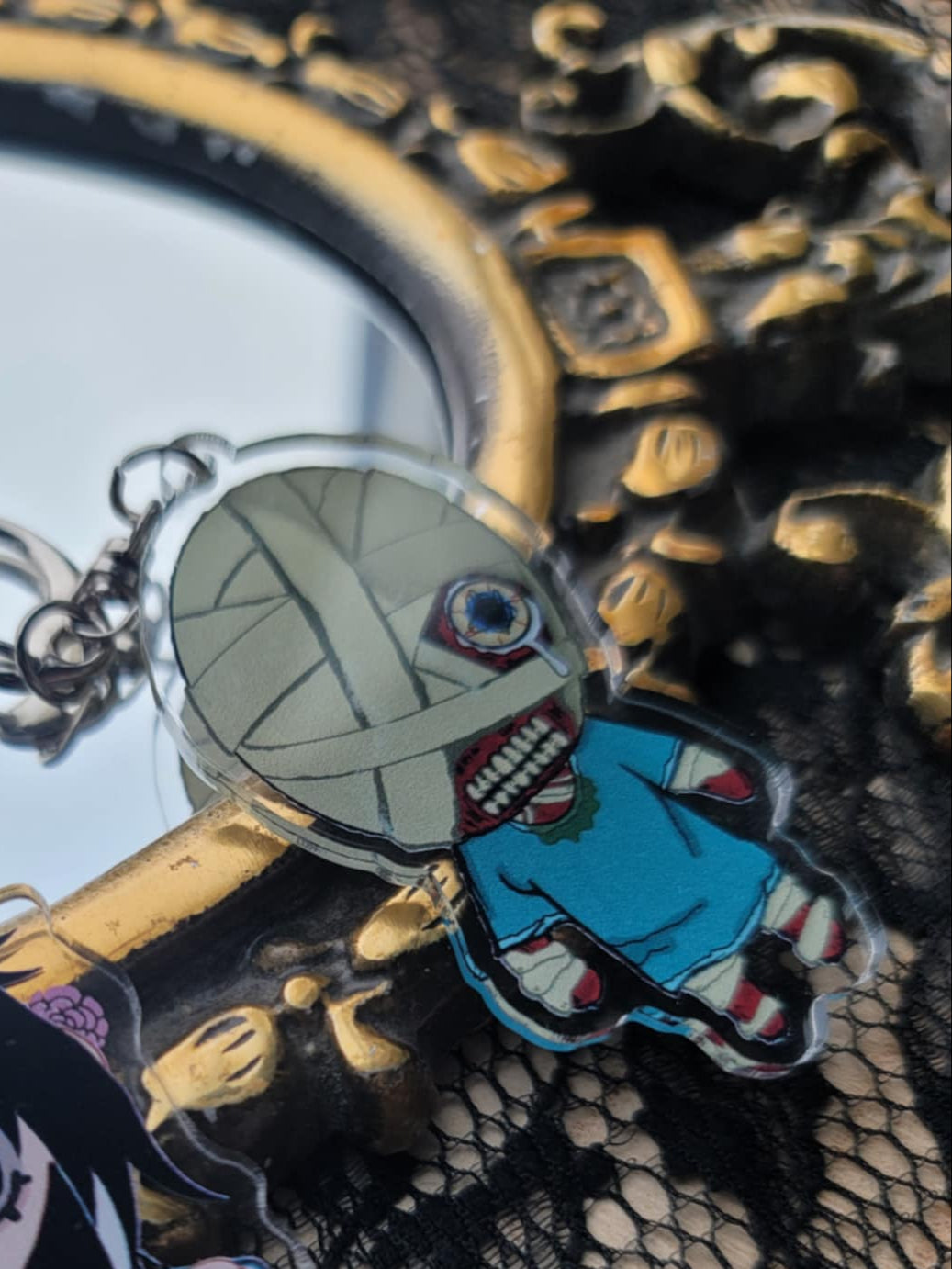 Crashed Curly Mouthwashing keychain